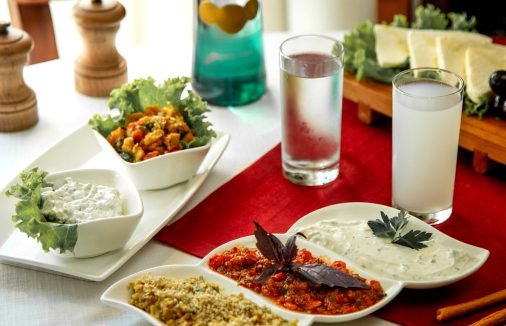 various salads with glass of water